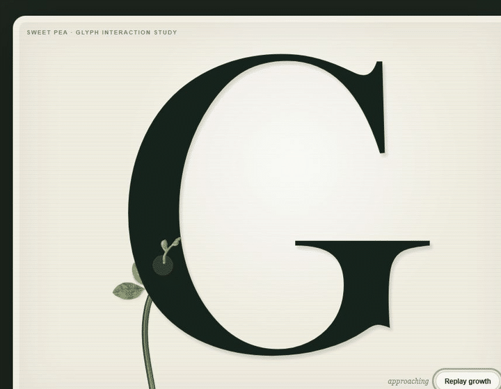 A sweet-pea vine growing around the letter G